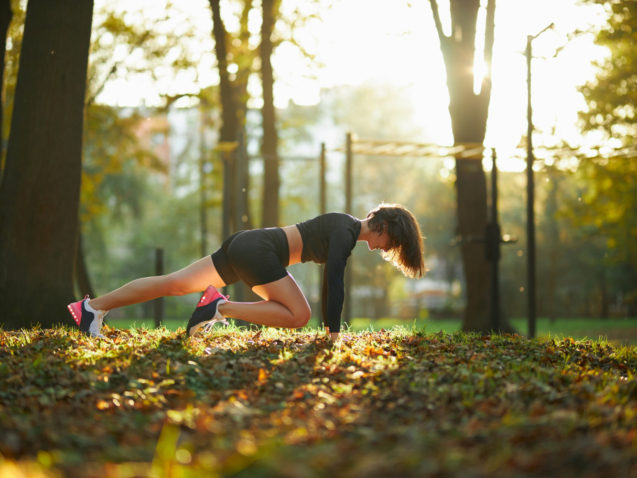 attractive-woman-doing-physical-activity-park